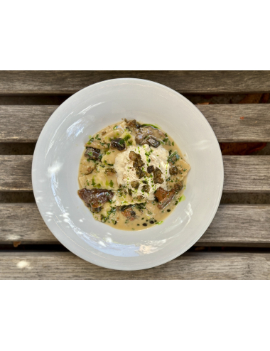 RAVIOLI WITH DUCK AND ESPUMA FROM WHITE MUSHROOMS