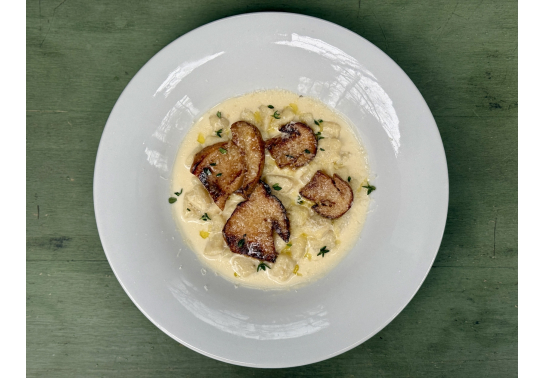 Gnocchi with Parmesan sauce and porcini mushrooms